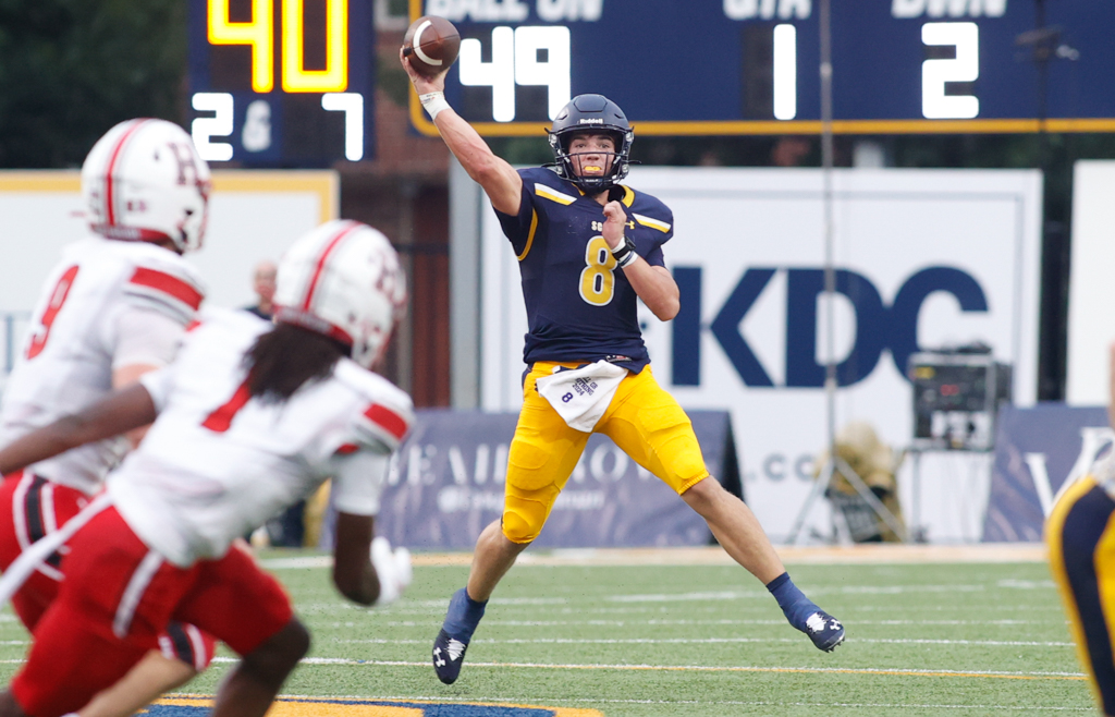 Scots Buck Randall throws for 399 yards against Rockwall Heath.