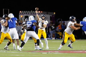 Buck Randall of HP leads the Scots to a 70-66 win over Tyler High School.