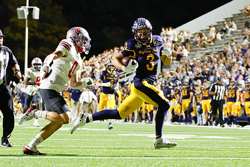 HP's Charlie Olmstead takes a 61 yard pass to the endzone for a touchdown against Lake Belton.